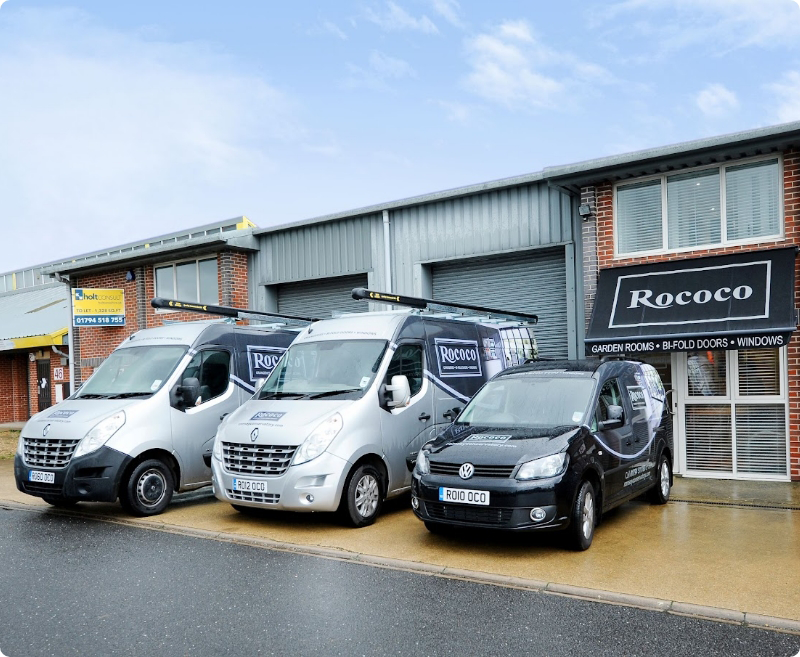Rococo showroom front with Rococo branded vehicles and vans.