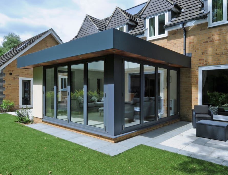 Orangery extension with four part and three part bi folding doors.