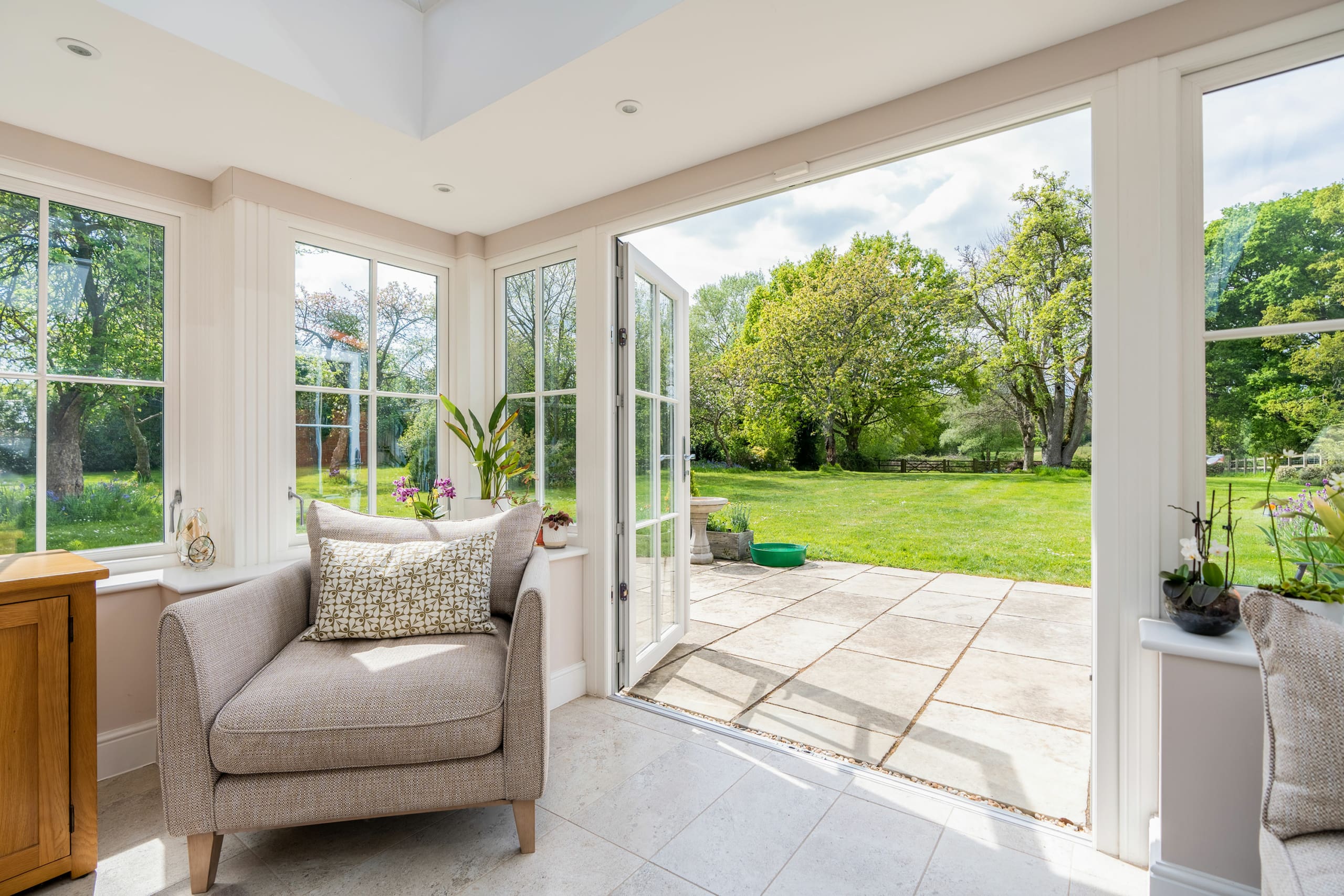 Modern extension with french doors to large patio and garden.