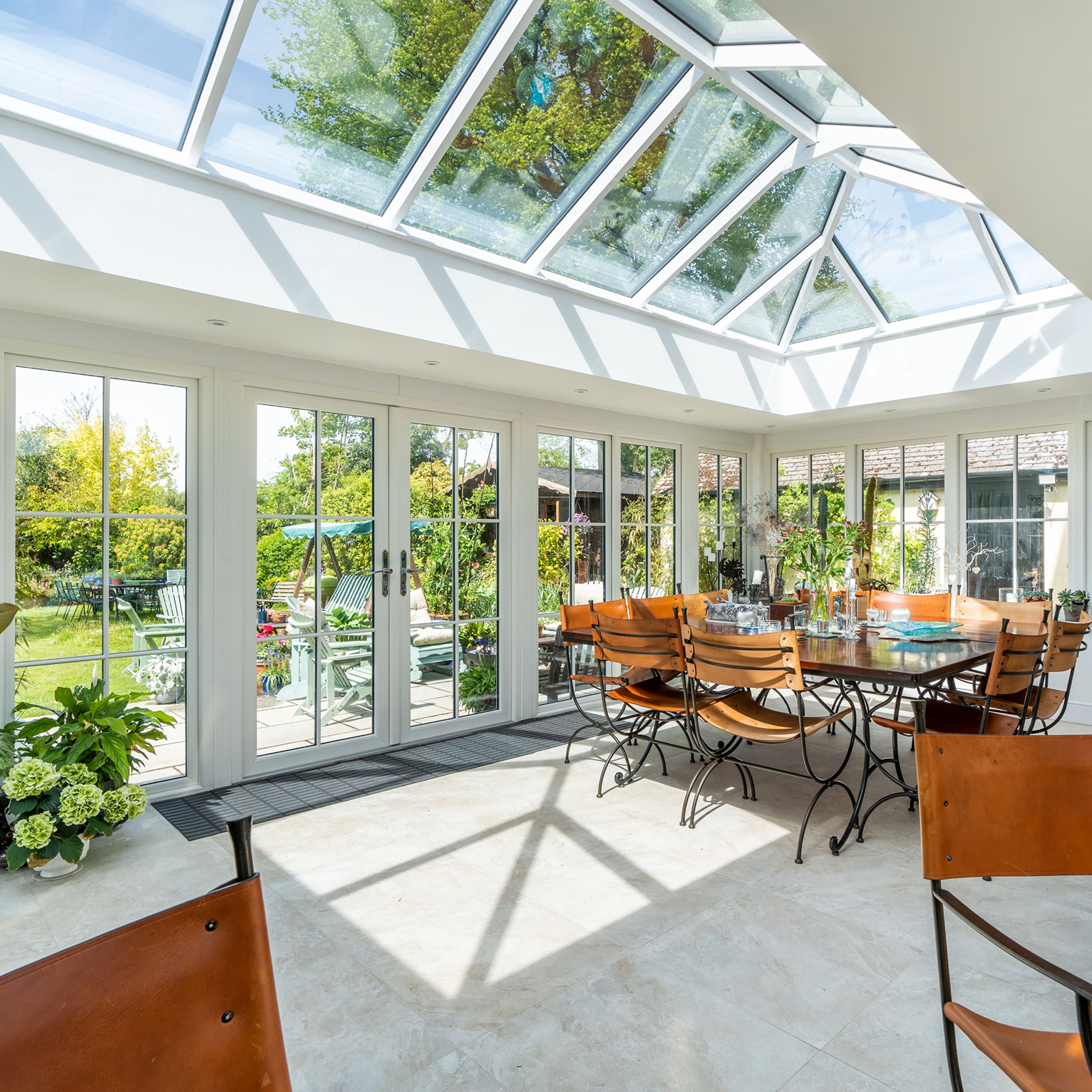 Beautiful home with stunning roof lantern orangery and traditional windows and doors.