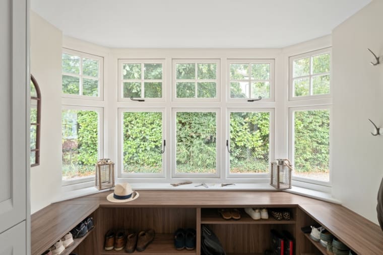 Interior of a bay window to a substantial home using the Flush product range from Evolution.