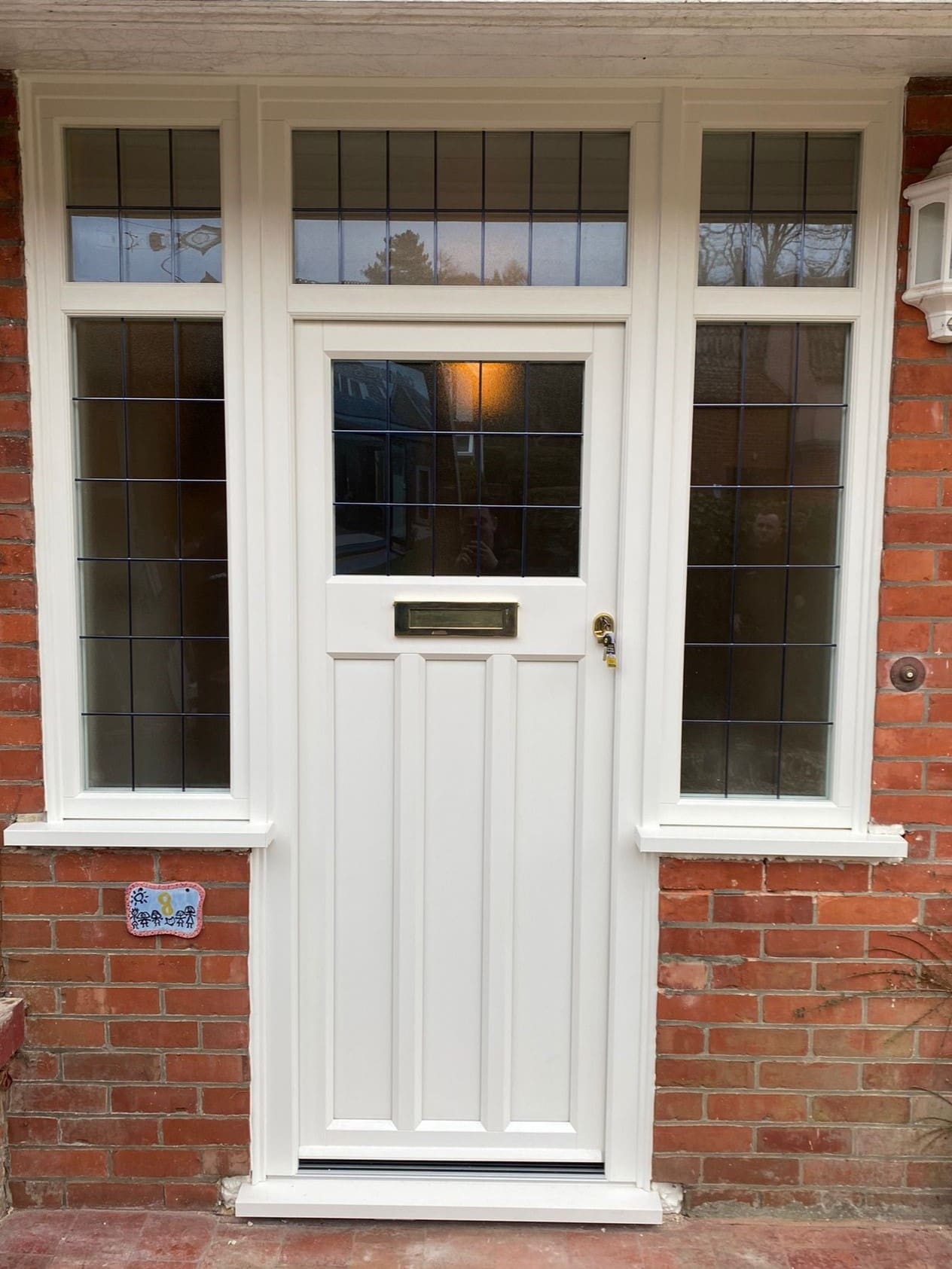 White door from the English Door Company with glass panelling.
