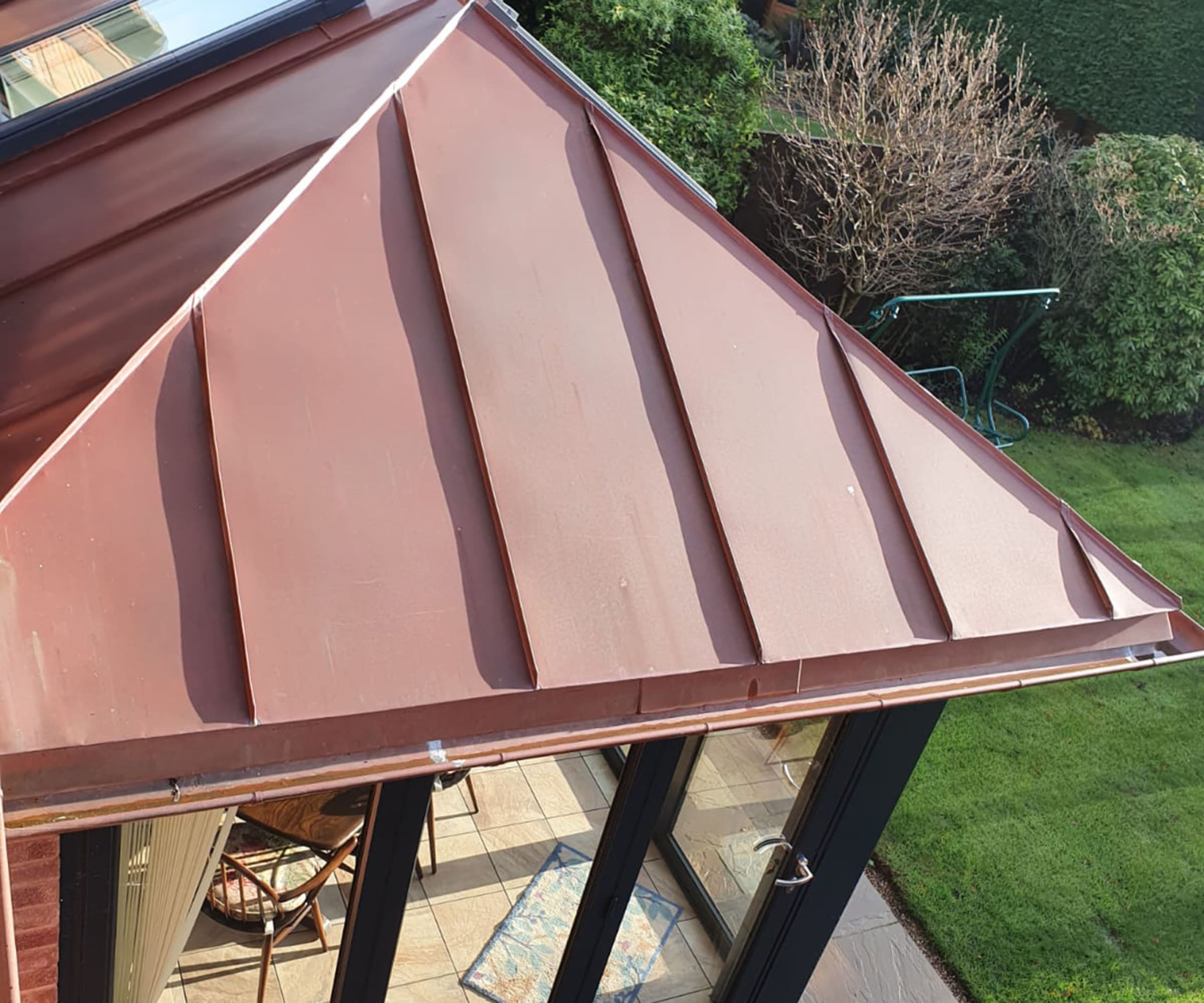 Copper roof extension to an orangery.